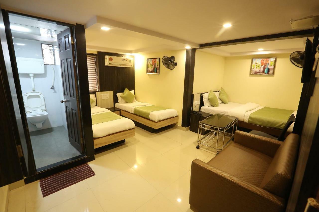 Hotel Happyland Мумбаи Экстерьер фото
